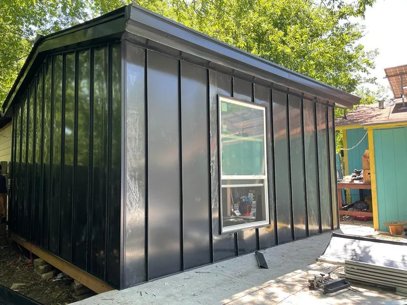 Black standing seam metal wall panels for Roof Inspection in Green Brook